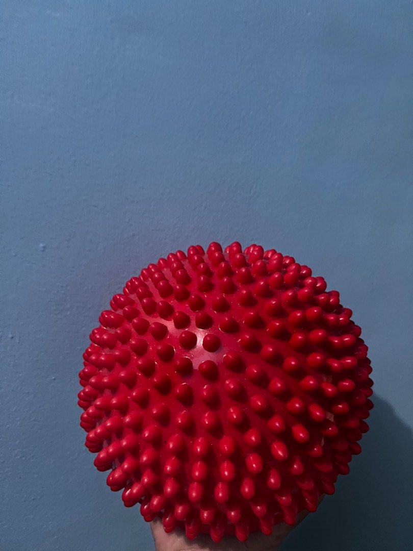 Red Spiky Massage Yoga Ball (Category: Massage Devices) located in Pasay City. Submitted by beye01 (Listing ID 1412696849, Image 3). Description: - Red spiky massage ball - Designed for self-massage and muscle relief - Features firm, rounded spikes for targeted pressure - Durable material - Suitable for feet, back, and shoulders Please check out my other items for sale. Thank you!.