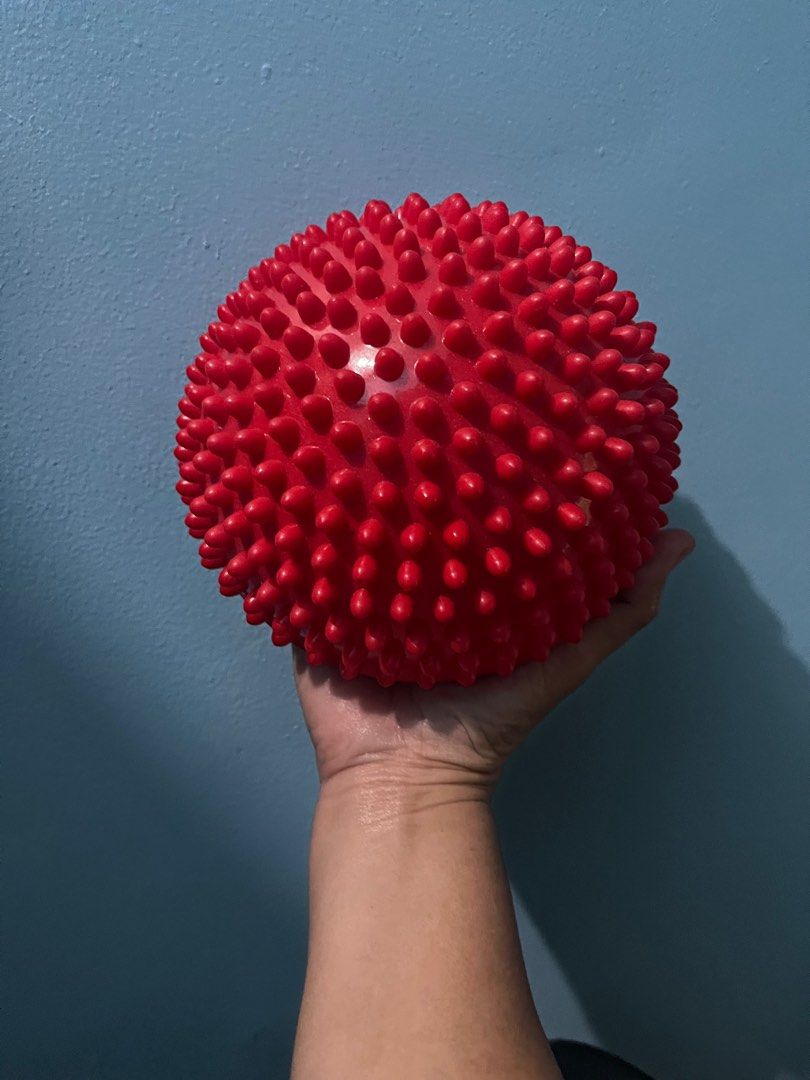 Red Spiky Massage Yoga Ball (Category: Massage Devices) located in Pasay City. Submitted by beye01 (Listing ID 1412696849, Image 2). Description: - Red spiky massage ball - Designed for self-massage and muscle relief - Features firm, rounded spikes for targeted pressure - Durable material - Suitable for feet, back, and shoulders Please check out my other items for sale. Thank you!.