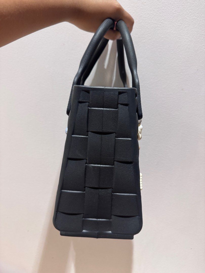 Rubber Bucket Bag (Category: Shoulder Bags) located in Makati City. Submitted by extra.mm (Listing ID 1412693030, Image 2). Description: Rubber Bucket Bag - black - washable - with cute pins RFS: Decluttering .