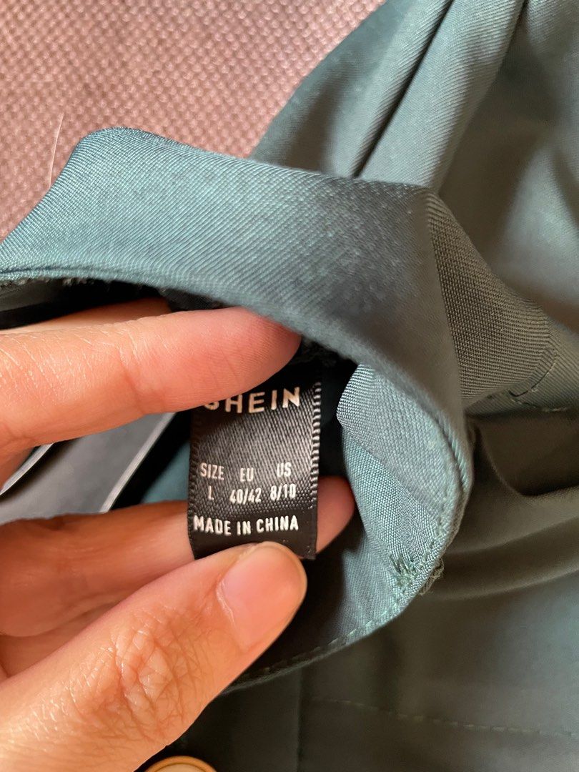 Shein Green Trousers - Size L (Category: Other Bottoms) located in Quezon City. Submitted by anyapot (Listing ID 1412620099, Image 2). Description: - Shein green trousers - Size: L (EU 40/42, US 8/10) - Features: Button closure, pleats - Material: 100% polyester - Classic design, suitable for various occasions.