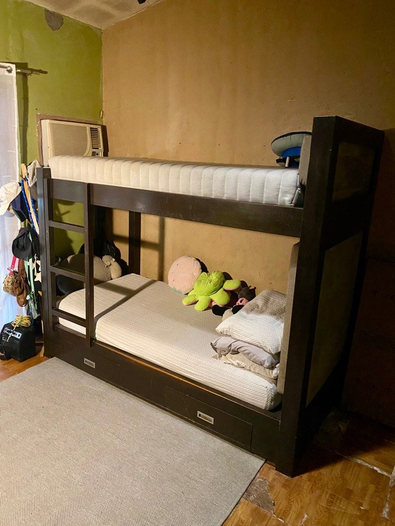 Solid Wood Frame Double Deck Bed (Category: Bed Frames & Mattresses) located in Las Pinas. Submitted by mmishuku (Listing ID 1412571325, Image 3). Description: Bed Frame for Sale – Good Used Condition🤩 Sturdy and well-maintained bed frame in solid construction with a classic design that fits well in any bedroom. Details: • Bed frame only (❌ mattress not included) selling mattresses separately.. pm for inquiries • Strong and durable wood, althoug