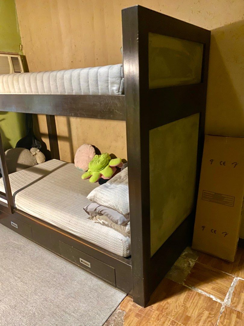 Solid Wood Frame Double Deck Bed (Category: Bed Frames & Mattresses) located in Las Pinas. Submitted by mmishuku (Listing ID 1412571325, Image 2). Description: Bed Frame for Sale – Good Used Condition🤩 Sturdy and well-maintained bed frame in solid construction with a classic design that fits well in any bedroom. Details: • Bed frame only (❌ mattress not included) selling mattresses separately.. pm for inquiries • Strong and durable wood, althoug