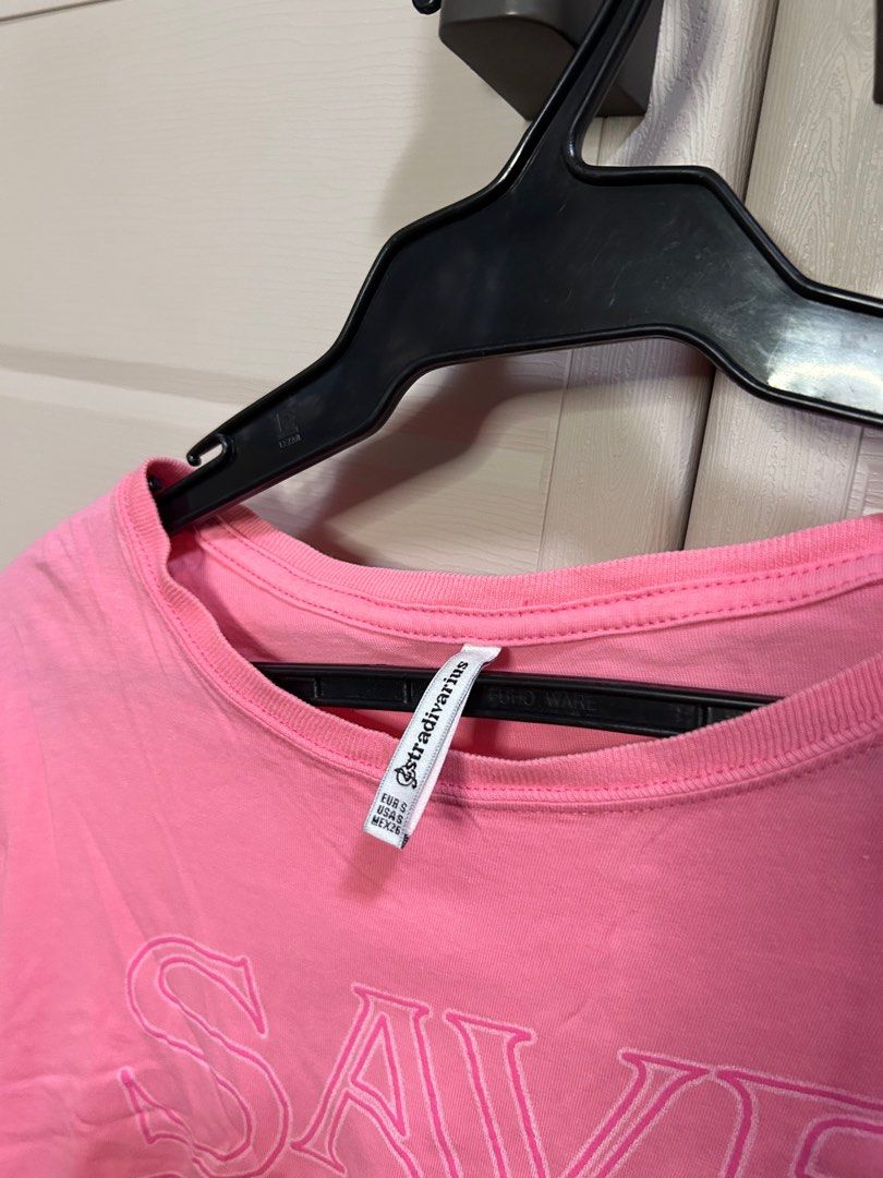 Stradivarius Pink Save The Earth Crop Top (Category: Shirts) located in Manila. Submitted by closettocounter (Listing ID 1412586363, Image 3). Description: - Stradivarius crop top - Pink color - "SAVE THE EARTH" embroidered design - Size: S - Round neckline - Short sleeves - Raw edge hem.