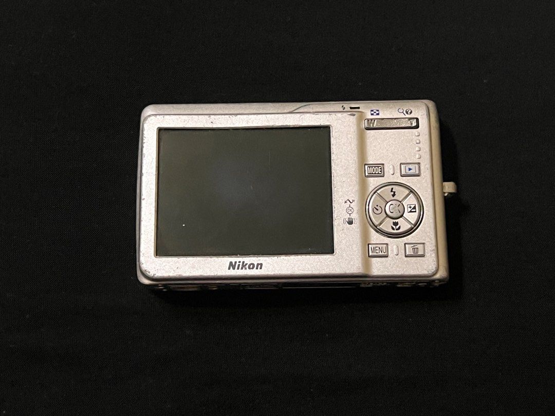 (UNTESTED) Nikon Coolpix S200 (Category: Cameras) located in Binangonan. Submitted by camco.7 (Listing ID 1412531990, Image 2). Description: Untested! Pls buy at your own risk. Selling as is. Unit lang po. Honest condition: It has a lot of marks and scratches. Lens part is also a bit tight to the feel. Most likely be for repair, but unfortunately there's not a lot of places for camera repair here in the province so I couldn't get it checked, nor 