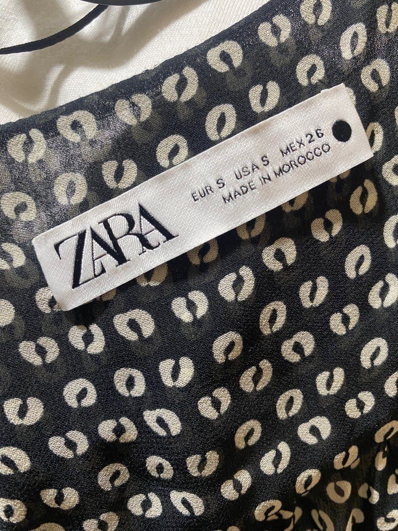 Zara Polka Dot Mini Dress (Category: Dresses) located in Pasay City. Submitted by _jkching (Listing ID 1412564712, Image 3). Description: - Zara mini dress - Polka dot pattern - V-neckline - Long sleeves - Ruched front detail - Size S - Made in Morocco.