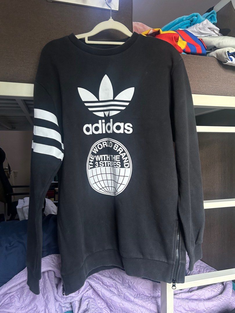 Adidas Black Sweatshirt with Side Zipper (Category: Longsleeves) located in Quezon City. Submitted by sofierz (Listing ID 1412764355, Image 1). Description: - fits up to medium.