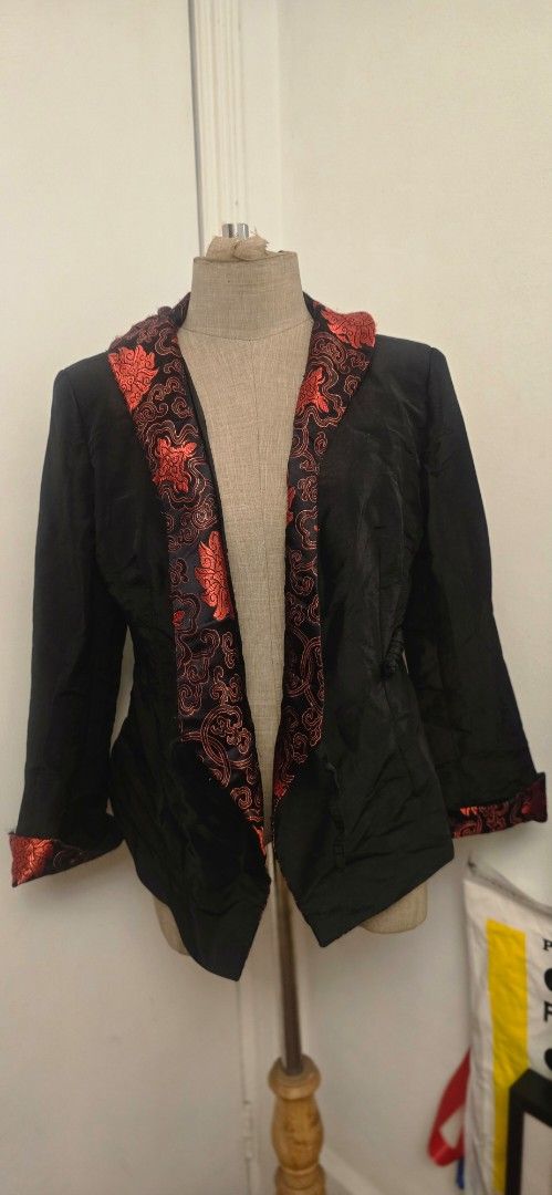 Black Jacket with Red Floral Embroidery (Category: Coats, Jackets and Outerwear) located in Manila. Submitted by foxydivas (Listing ID 1412823756, Image 1). Description: bought in U.S. good quality material barely used. has silk design on colar and cuffs can fit small and medium bought it 5500 pesos.
