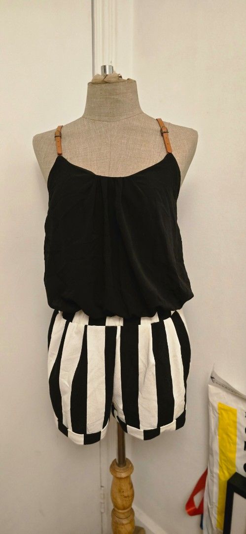 Black Top with Striped Shorts romper (Category: Sets or Coordinates) located in Manila. Submitted by foxydivas (Listing ID 1412824228, Image 1). Description: - Black top with brown straps - Striped shorts with black and white pattern - Made of soft material made in U.S. - Shown on a mannequin.