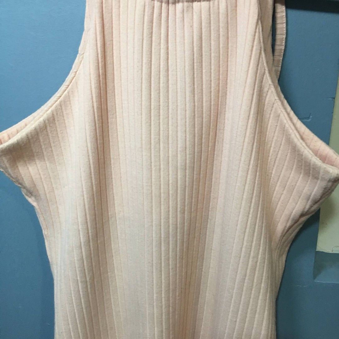 [Blush] Pink Ribbed Dress - Size 14 (Category: Dresses) located in Caloocan City. Submitted by thirfty.loved (Listing ID 1412774183, Image 2). Description: ‼️‼️ MUST READ ‼️‼️ Description: - Blush (SM Dept. Store) - Teens - Pink dress - Ribbed texture - Halter neckline - Bodycon fit - Tie back detail Flaws: Has some yellow stain on some part Size: 14 Length: 72cm NOTE: The actual color of the product may slightly vary from the color in the photo 