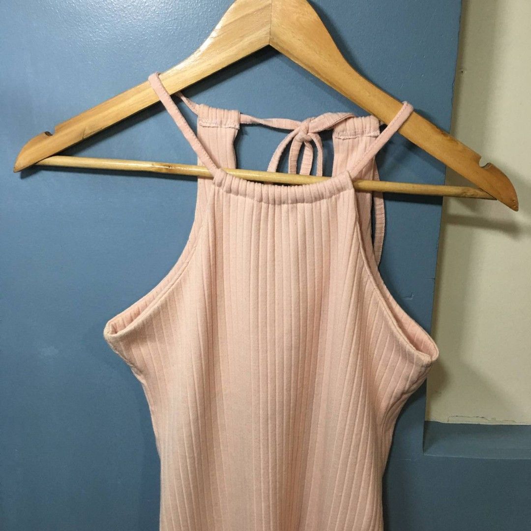 [Blush] Pink Ribbed Dress - Size 14 (Category: Dresses) located in Caloocan City. Submitted by thirfty.loved (Listing ID 1412774183, Image 1). Description: ‼️‼️ MUST READ ‼️‼️ Description: - Blush (SM Dept. Store) - Teens - Pink dress - Ribbed texture - Halter neckline - Bodycon fit - Tie back detail Flaws: Has some yellow stain on some part Size: 14 Length: 72cm NOTE: The actual color of the product may slightly vary from the color in the photo 