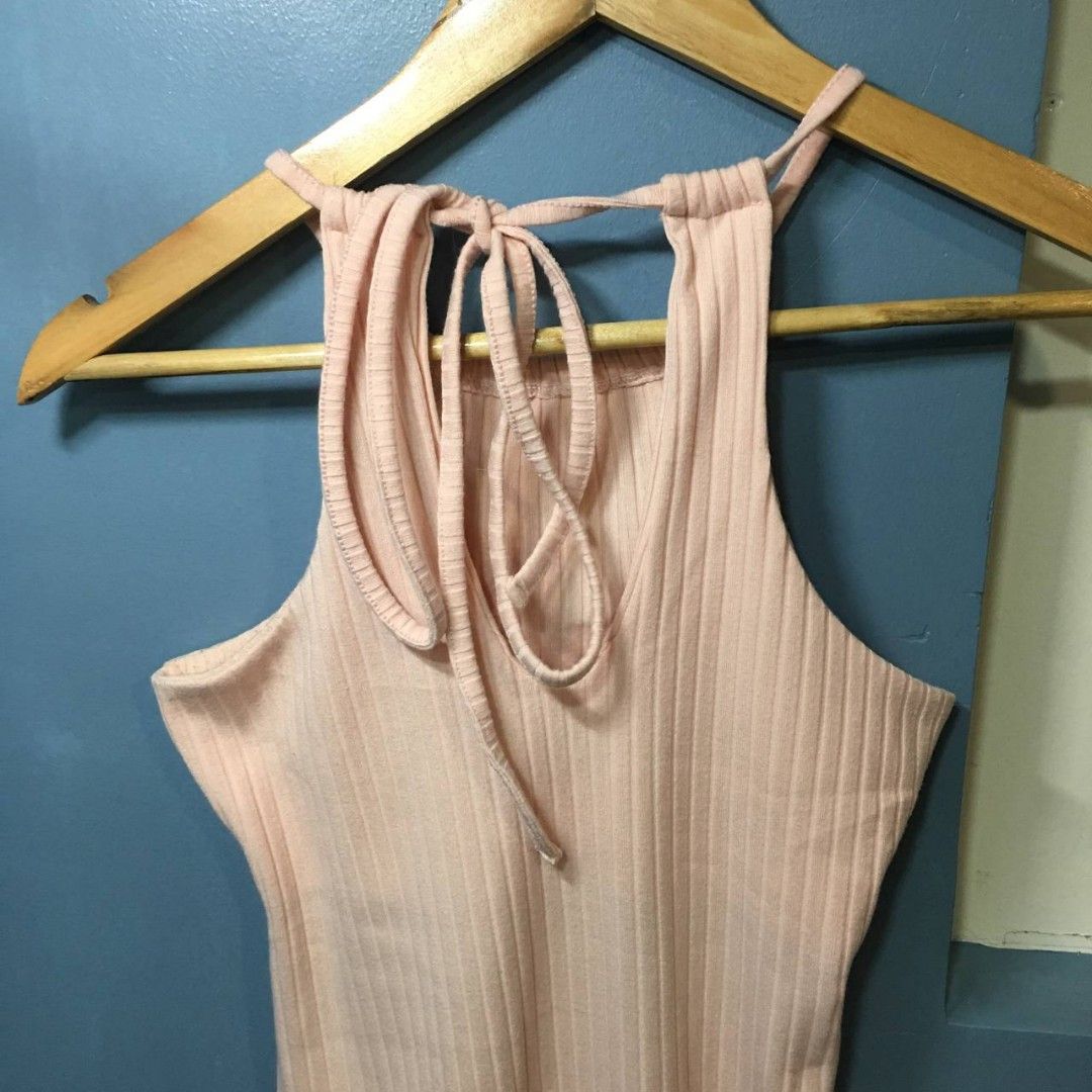 [Blush] Pink Ribbed Dress - Size 14 (Category: Dresses) located in Caloocan City. Submitted by thirfty.loved (Listing ID 1412774183, Image 3). Description: ‼️‼️ MUST READ ‼️‼️ Description: - Blush (SM Dept. Store) - Teens - Pink dress - Ribbed texture - Halter neckline - Bodycon fit - Tie back detail Flaws: Has some yellow stain on some part Size: 14 Length: 72cm NOTE: The actual color of the product may slightly vary from the color in the photo 