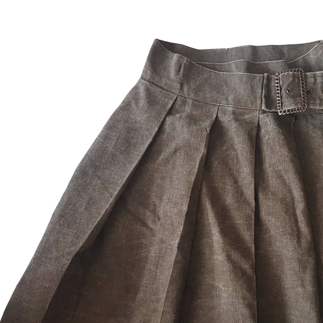 Brown Pleated Skirt with Belt (Category: Skirts) located in Sorsogon. Submitted by svyad (Listing ID 1412771987, Image 2). Description: Stylish brown pleated skirt featuring a matching belt with a decorative buckle. The skirt has a flattering A-line shape and a classic design. The belt adds a touch of elegance and helps to define the waist. A versatile piece that can be dressed up or down. helping tags: y2k vintage skirt brown size range from S-L