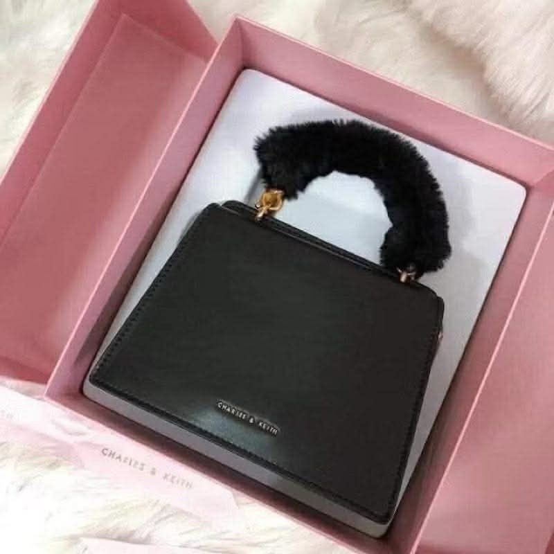 charles & keith fur bag (Category: Luxury Bags & Wallets) located in Manila. Submitted by aglpjs (Listing ID 1412717232, Image 2). Description: LAST 2PCS AVAILABLE (pre-order, eta 2-4 days) brandnew | fixed price & no lowballing. — pay first to secure and to avoid any cancellations and bogus buyers — strictly no reservations & cancellations — ship/deliver once onhand, no rush shipping. top grade only! with box & dustbag..