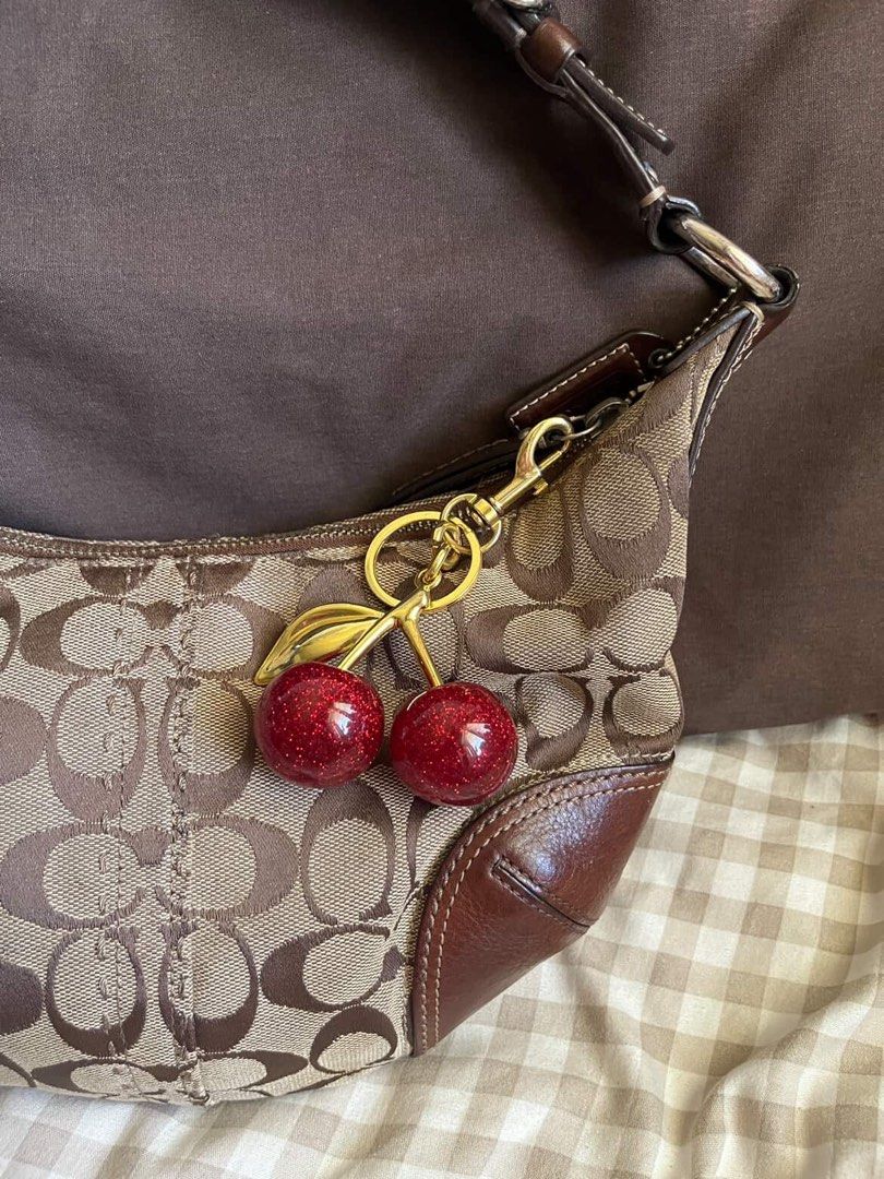 Coach Signature Shoulder Bag with Cherry Charm, Luxury, Bags & Wallets ...