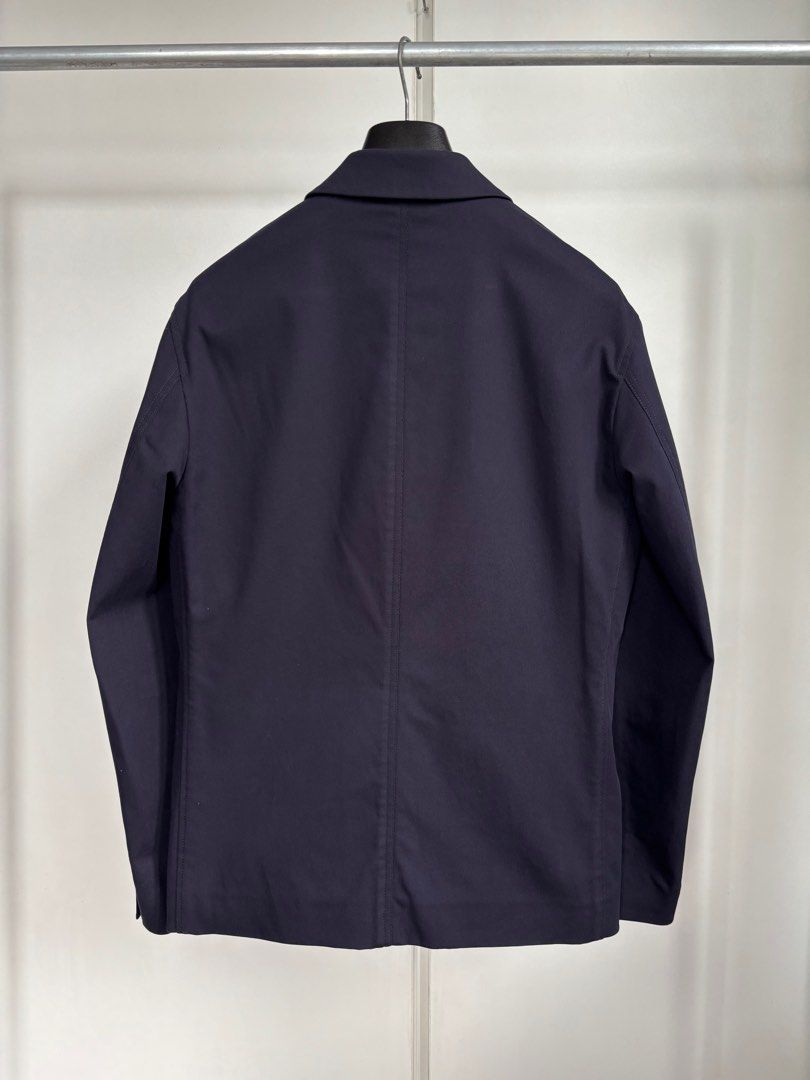 COS Navy Chore Jacket (Category: Coats, Jackets and Outerwear) located in Paranaque City. Submitted by grailonious (Listing ID 1412822361, Image 2). Description: - COS navy blue jacket. More streamlined, minimal take in the original French chore jacket - Tailored fit - Durable fabric blend - Made in Romania - Measurements in images.