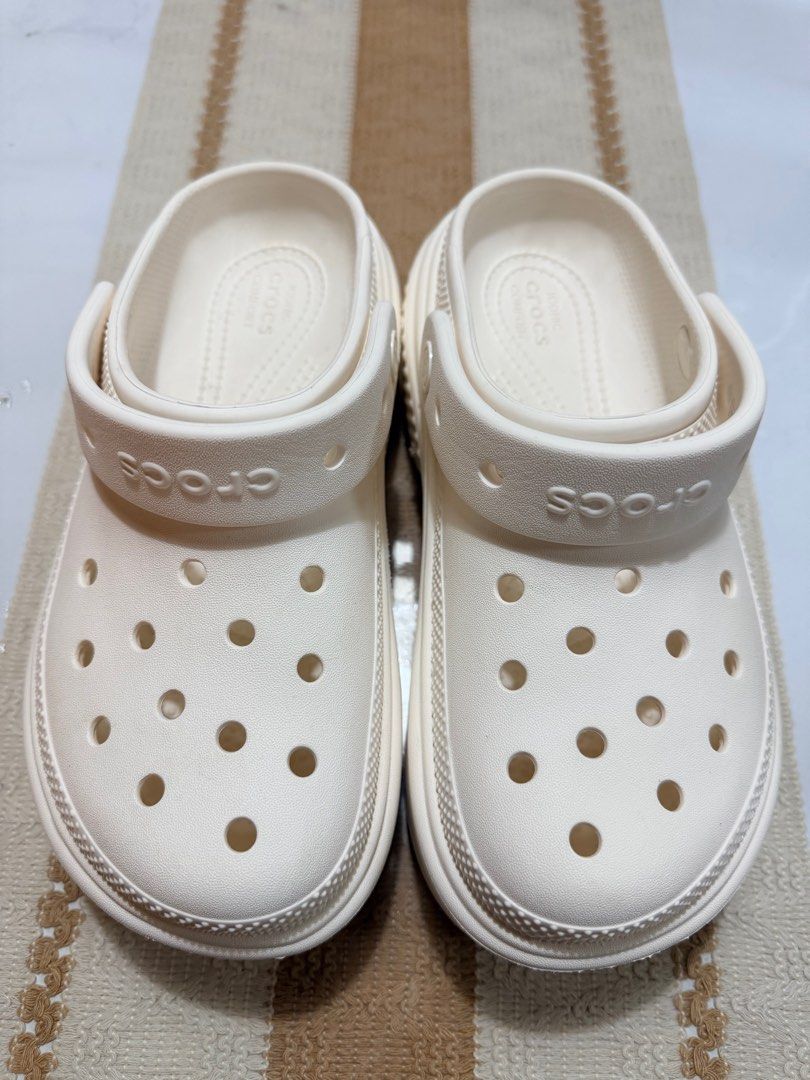 Crocs Women's Classic Platform Clog - White (Category: Slippers and slides) located in Caloocan City. Submitted by franzesfra99904 (Listing ID 1412843980, Image 2). Description: Classic Crocs platform clogs in white. Size 6. Used only 5 times. The original price was P4,245. These clogs offer the signature Crocs comfort with a stylish platform sole. Perfect for everyday wear, these shoes are easy to clean and maintain. They are a versatile additio
