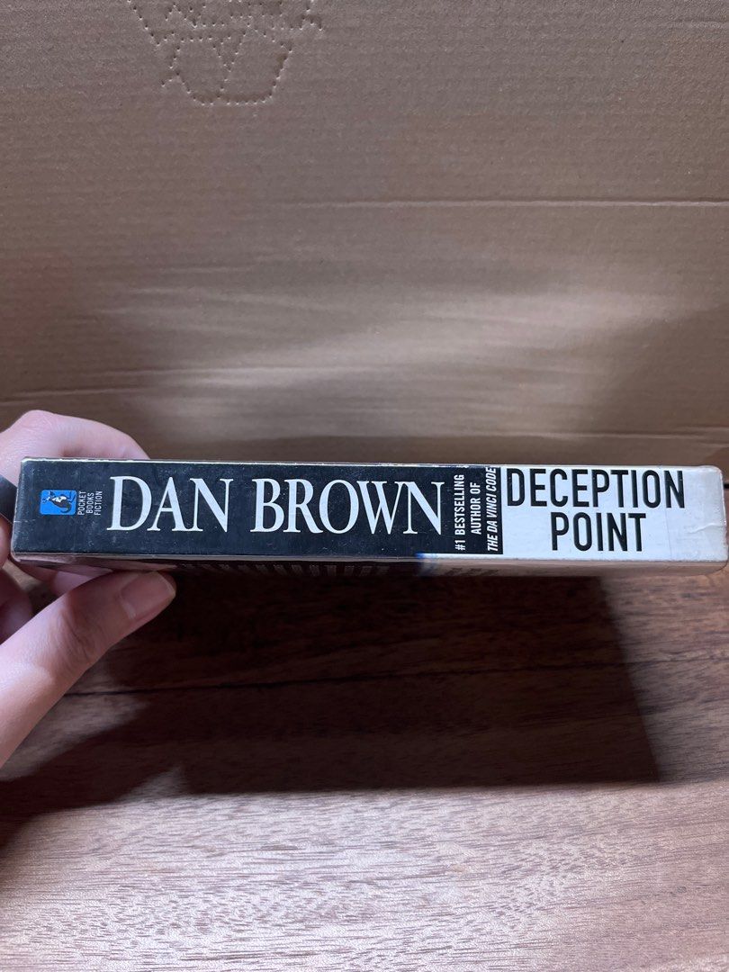Dan Brown Deception Point (Category: Storybooks) located in Pasig City. Submitted by shadow53529 (Listing ID 1412729209, Image 2). Description: Deception Point by Dan Brown - Paperback, mmpb - Condition: Spine intact, pages intact and shows browning *️⃣ Payment first, no COD MOP: GCash, Maya, BPI, BDO Shipping: J&T.
