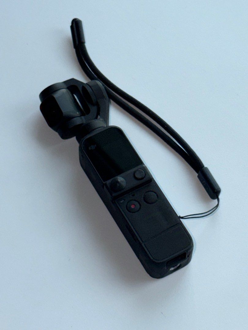 DJI Osmo Pocket 2 (Category: Cameras) located in Taguig. Submitted by dreamstudios (Listing ID 1412713313, Image 1). Description: - DJI Osmo Pocket camera 2 - Compact and portable - Features a built-in screen - Includes two control buttons - Comes with a wrist strap, original box - Color: Black.
