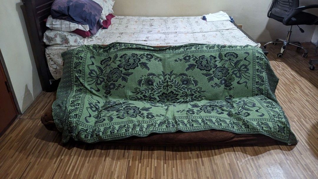 Foldable Floor Sofa Bed (Category: Sofas) located in Binan City. Submitted by lcxfrnndz (Listing ID 1412786700, Image 2). Description: Foldable floor sofa bed - Brown, plush fabric - Adjustable to different positions - Heavily used; advised na ipalinis po - Negotianle basta sure buyer at kukunin agad - Rough estimates of dimension in the photos - RFS: Need space sa bahay + di na nagagamit.