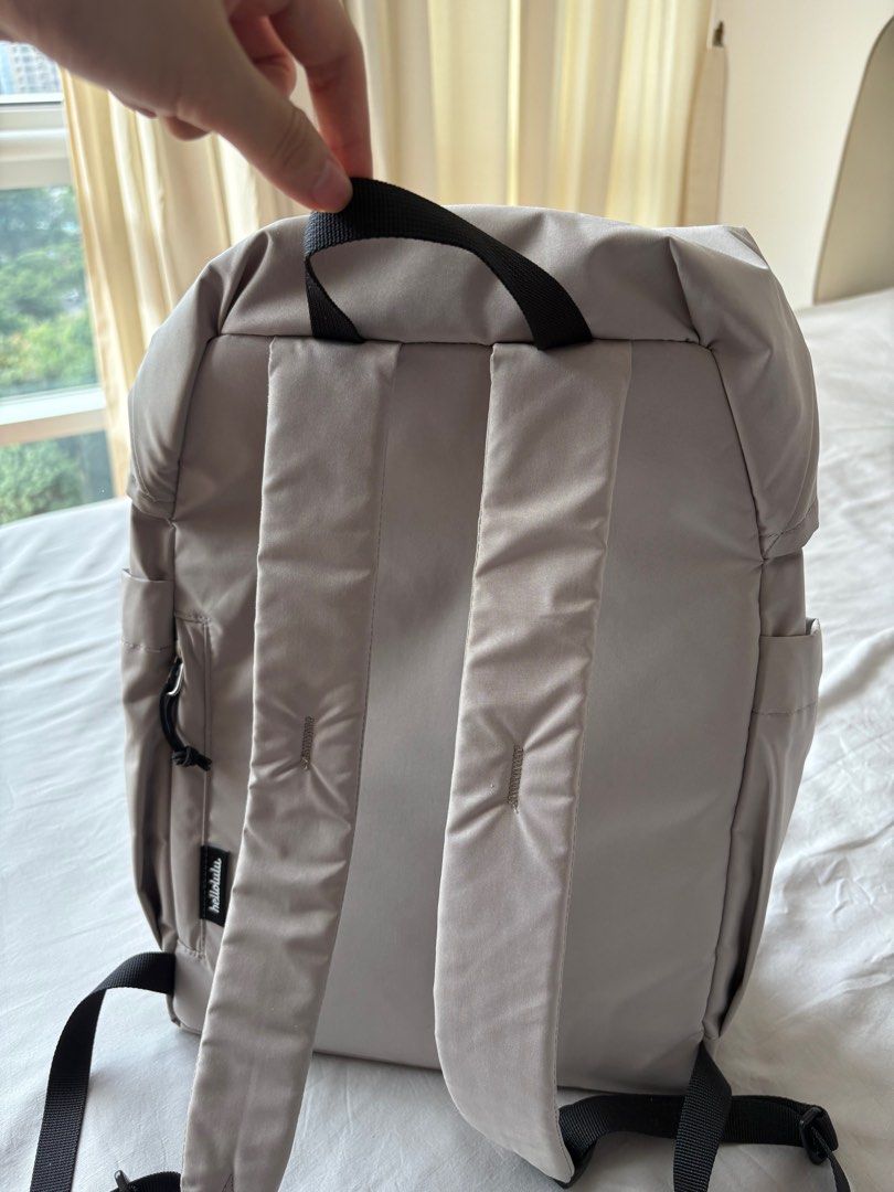 Hellolulu Backpack - Grey (Category: Backpacks) located in Singapore. Submitted by avot9488 (Listing ID 1412734607, Image 2). Description: - Adjustable straps and top handle - Roll-top closure with drawstring - Convenient side pockets - Ideal for everyday use.