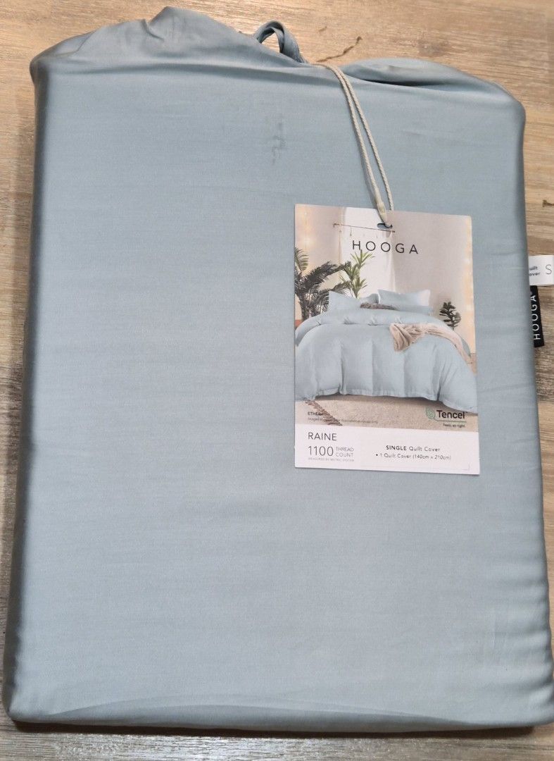 Hooga TENCEL Raine 1100 Thread Count Single Duvet Cover (Category: Bedding & Towels) located in Singapore. Submitted by baglover111 (Listing ID 1412808809, Image 1). Description: - Brand new Hooga Raine single duvet cover - 1100 thread count - Made from Tencel - Colour: Light blue/grey - Still in original packaging.