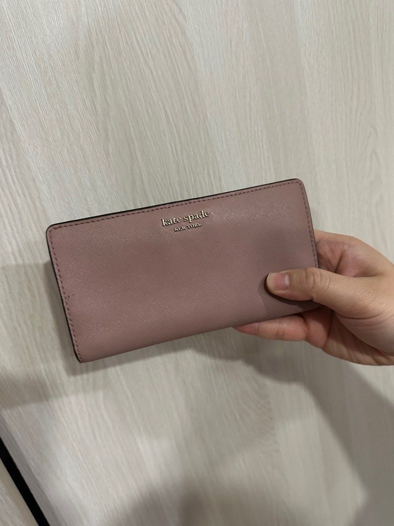 Kate Spade New York Wallet (Category: Wallets & Card holders) located in Paranaque City. Submitted by elenyuloque (Listing ID 1412822065, Image 1). Description: .