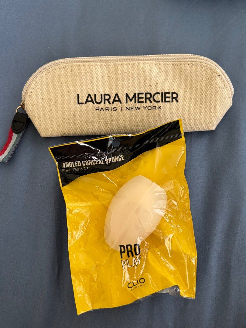 Bundle: Laura Mercier Pouch & Club Clio Foundation Sponge (Category: Other Accessories) located in Pasig City. Submitted by sunshine_007 (Listing ID 1412767385, Image 1). Description: Bundle: - Laura Mercier Pouch - Club Clio Foundation Sponge.