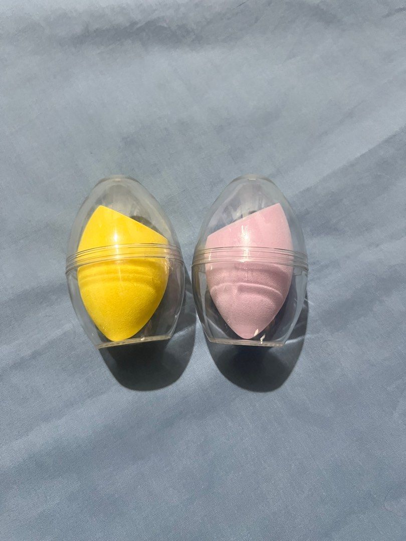 Makeup Sponge with Case (Category: Makeup) located in Manila. Submitted by ponyows (Listing ID 1412754833, Image 1). Description: Makeup sponges (beauty blenders or powder puffs) housed in a transparent, egg-shaped storage case from KKV (Brand new/ Never used) ₱100 each ₱180 for both mop: gcash/bpi mod: lalamove / j&t location: sampaloc manila no return & refund .
