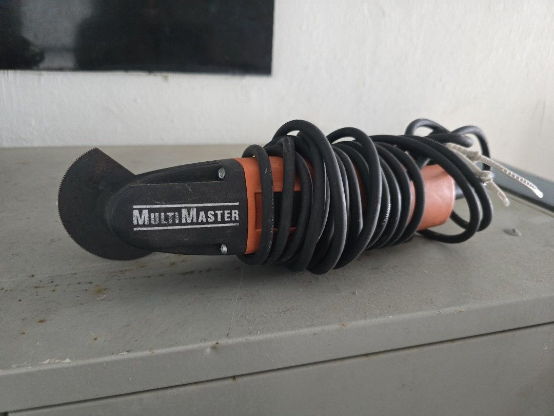 MultiMaster Multi-Tool (Category: Home Improvement Tools & Accessories) located in Singapore. Submitted by sandyanne (Listing ID 1412802273, Image 1). Description: Used MultiMaster multi-tool. Includes a cutting disc. The plug is a UK type. Perfect for various cutting and grinding tasks..
