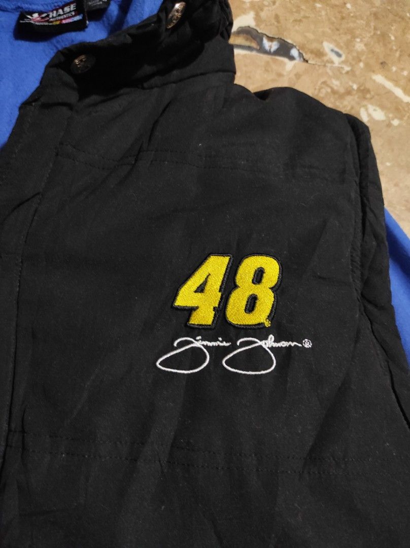 NASCAR Chase Authentics Jacket (Category: Coats, Jackets and Outerwear) located in Las Pinas. Submitted by jeusmanlangit (Listing ID 1412799479, Image 3). Description: Chase Authentics NASCAR jacket - Black vest with blue sleeves and hood - Embroidered "48" on front - Button-up front - Hooded NO ISSUE 800 PESOS LANG DM 📩.