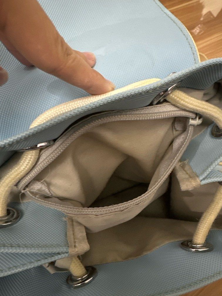 Original Lacoste Small Backpack (Sky Blue) (Category: Luxury Bags & Wallets) located in Manila. Submitted by getreadyandeclutter (Listing ID 1412828007, Image 3). Description: - Original Lacoste Backpack - Color: Sky Blue - Well taken care of, In good condition, needs cleaning only‼️ - Price negotiable to ₱3.5k - Adjustable Strap .