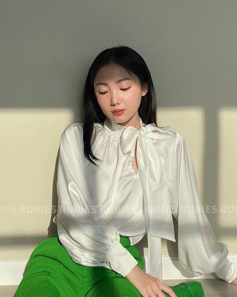 Rubies White Silk Ribbon Tie Top (Category: Longsleeves) located in Manila. Submitted by declutterwithme101 (Listing ID 1412780611, Image 1). Description: Bought from vietnam pasabuy Too loose on me since this is freesize Can fit S-L Last priced posted this is BNWT :).