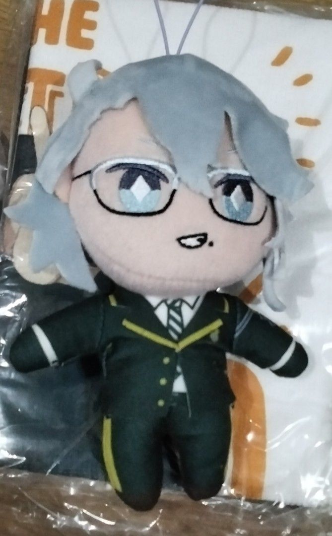 Twisted wonderland Anime Plushie (Category: Plushies & Soft Toys) located in Santa Rosa. Submitted by animemerchcollection (Listing ID 1412714014, Image 1). Description: - Adorable plushie character. - Features blue hair and glasses. - Wearing a dark green suit with yellow accents. - Small, smiling face. - Perfect for anime fans and collectors..