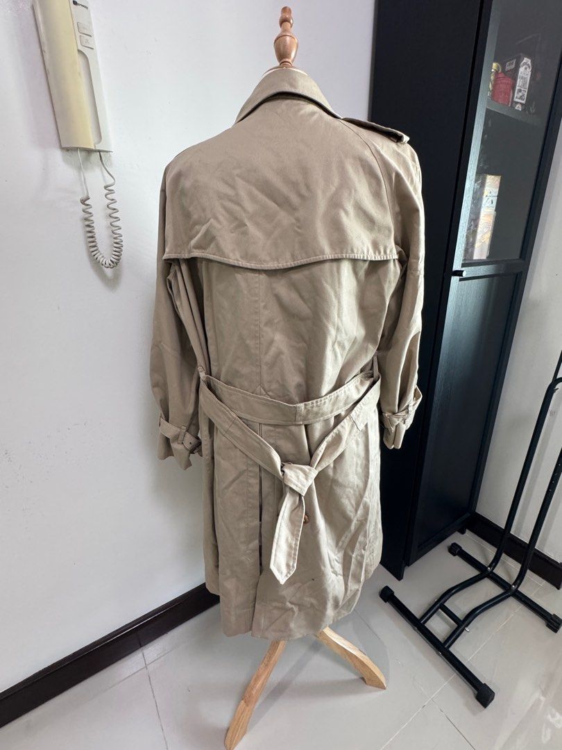 Vintage BurberryTrench Coat (Category: Coats, Jackets and Outerwear) located in Quezon City. Submitted by vaninni (Listing ID 1412724080, Image 2). Description: - Authentic Burberrys trench coat - Double-breasted design - Includes button closures and matching belt - Features iconic Burberry check lining - Made in England - Timeless design.