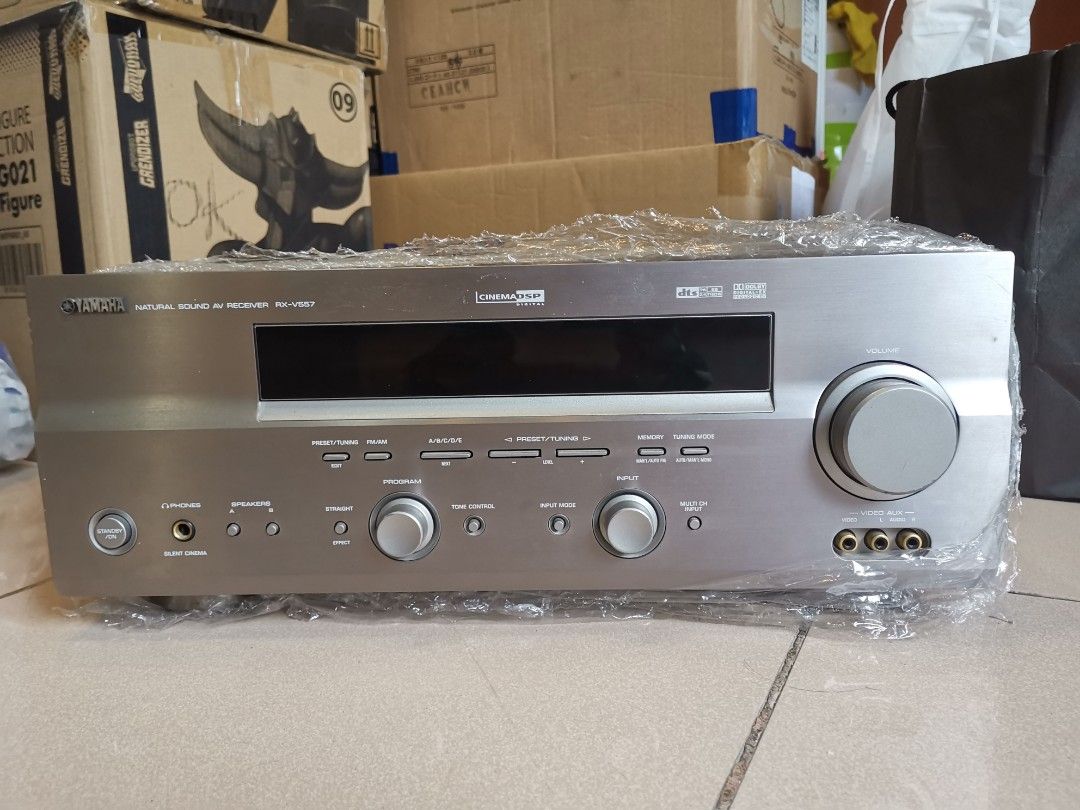 Yamaha RX-V557 AV Receiver (Category: Soundbars, Speakers & Amplifiers) located in Manila. Submitted by genesis11_21 (Listing ID 1412772911, Image 1). Description: WORKING GOOD CONDITION Yamaha RX-V557 AV receiver. Features multiple input and output ports for various audio and video devices. It has a power rating of 360 watts and operates on 220/230-240 volts. Made in Malaysia. Includes a voltage selector for 230-240V. The front panel has various