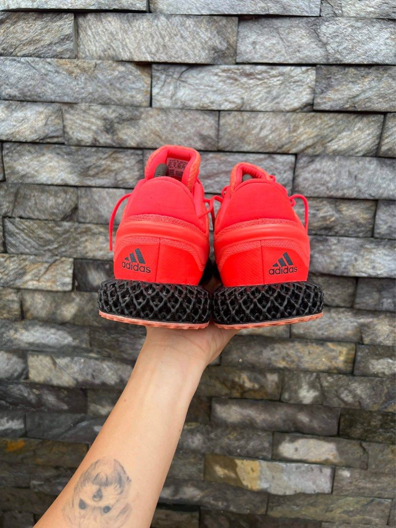 Adidas 4D Running Shoes size 8.5 men (Category: Sneakers) located in Bacolod City. Submitted by novymaesel14868 (Listing ID 1407933354, Image 3). Description: - Adidas 4D running shoes - Vibrant red colorway - Features iconic black three stripes - Unique black and orange sole - Size: US 8.5, UK 8, FR 42, JP 265, CHN 260 - Made in Vietnam - Style code: FV6956.