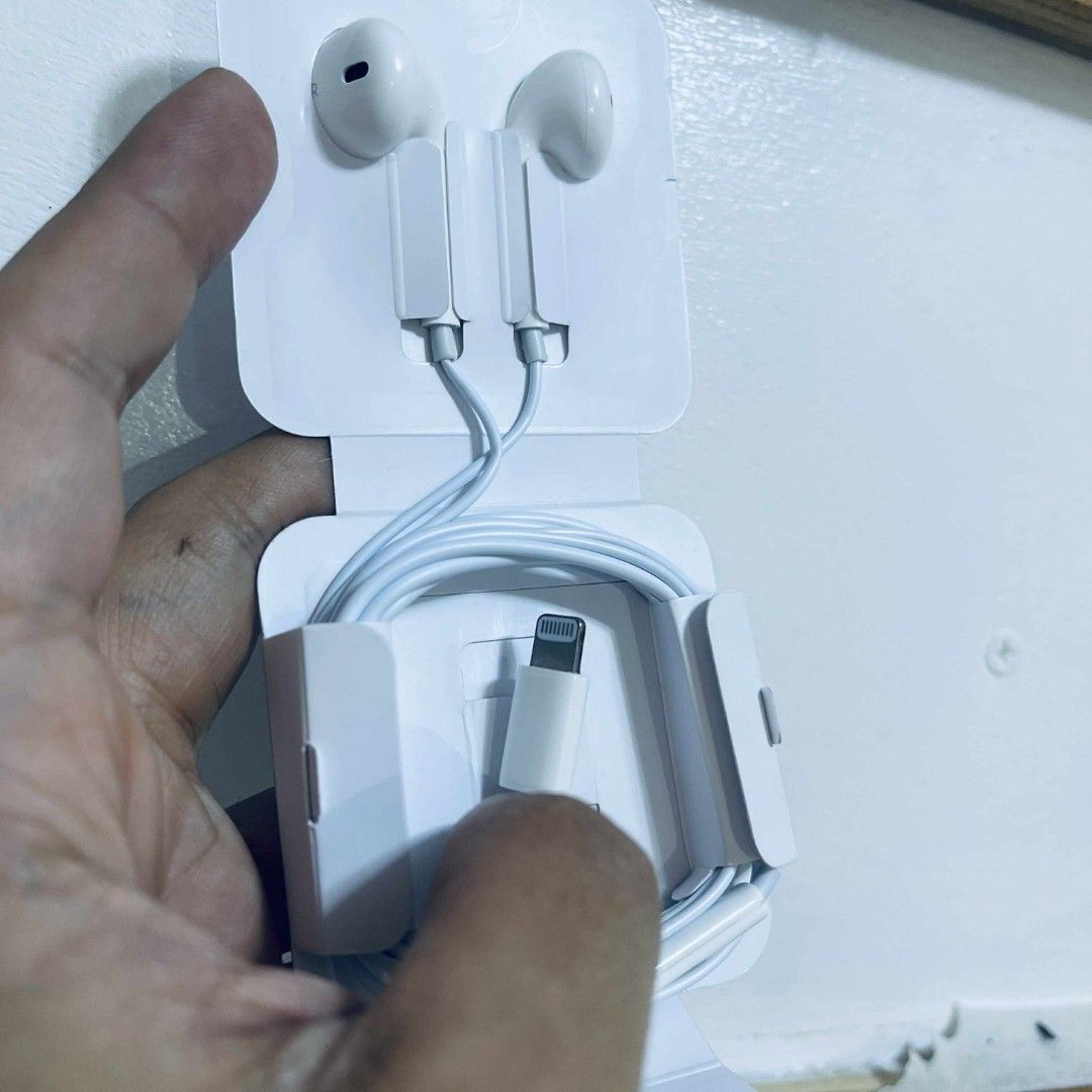 Apple 🍏 EarPods (Lightning Connector (Category: Headphones & Headsets) located in Manila. Submitted by walsgadsaccesorries (Listing ID 1407931744, Image 3). Description: EarPods (Lightning Connector Apple's EarPods with Lightning Connector are wired, in-ear headphones with a built-in microphone and remote, designed for devices with a Lightning port and iOS 10 or later. Key specifications include a unique design for comfort, high-quality audio wi