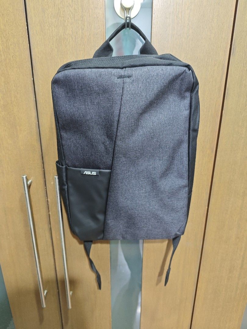 ASUS Laptop Backpack Brand New (Category: Backpacks) located in San Juan City. Submitted by monstercombi (Listing ID 1407890589, Image 1). Description: ASUS backpack features a sleek, modern design. It has a main compartment and a front pocket. The back panel and shoulder straps are padded for comfort. Perfect for carrying your laptop and other essentials. Brand new with Plastic. San Juan City Location Buyer shoulders shipping fee.