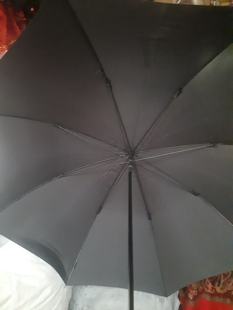 Automatic light weight long black umbrella 37" (Category: Umbrellas) located in Manila. Submitted by luckycharm_215 (Listing ID 1407807686, Image 1). Description: vgc.