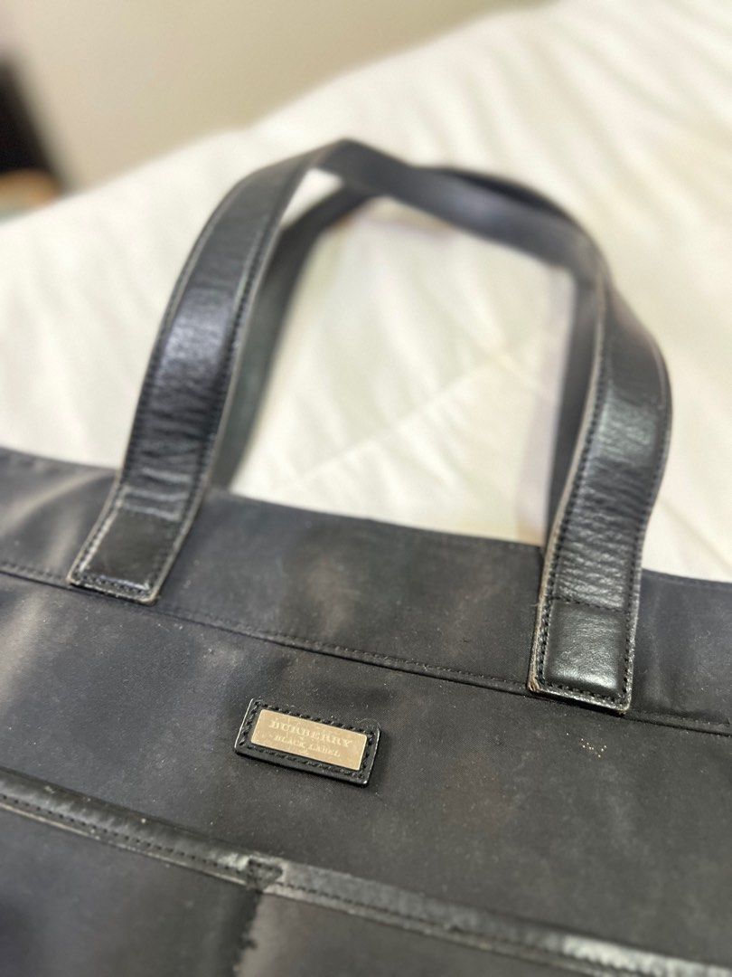 Burberry black label office bag (Category: Luxury Bags & Wallets) located in Muntinlupa City. Submitted by fantaxia0317 (Listing ID 1407882294, Image 2). Description: Authentic, well used but still functional and nice! Personal item not thrifted. As is. Negotiable just make an offer.