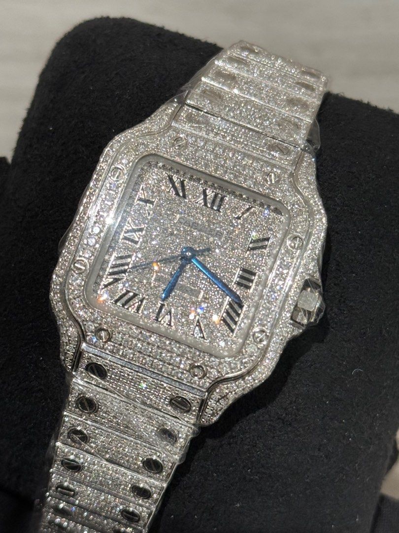 Cartier Santos Iced Out Medium 2025 (Category: Luxury Watches) located in Pasig City. Submitted by kjeldran00 (Listing ID 1407868445, Image 3). Description: Cartier Santos Iced Out Medium 2025 Condition: 10/10 (Brand New) Inclusions: Outer Box, Watch Box, and Warranty Card DOP: May 2025 Specifications: Automatic Movement Caliber 1847 MC Case Diameter: 35.1mm Case Thickness: 8.82mm Sapphire Crystal Blue Hands Water Resistance: 100m Foreign AD Refe