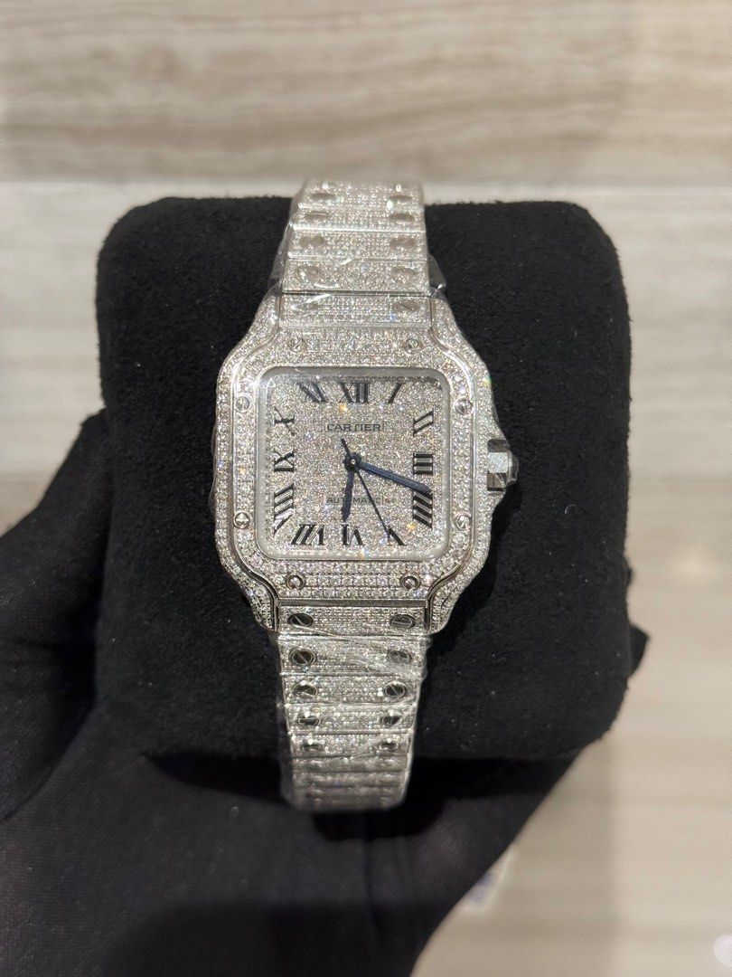 Cartier Santos Iced Out Medium 2025 (Category: Luxury Watches) located in Pasig City. Submitted by kjeldran00 (Listing ID 1407868445, Image 1). Description: Cartier Santos Iced Out Medium 2025 Condition: 10/10 (Brand New) Inclusions: Outer Box, Watch Box, and Warranty Card DOP: May 2025 Specifications: Automatic Movement Caliber 1847 MC Case Diameter: 35.1mm Case Thickness: 8.82mm Sapphire Crystal Blue Hands Water Resistance: 100m Foreign AD Refe