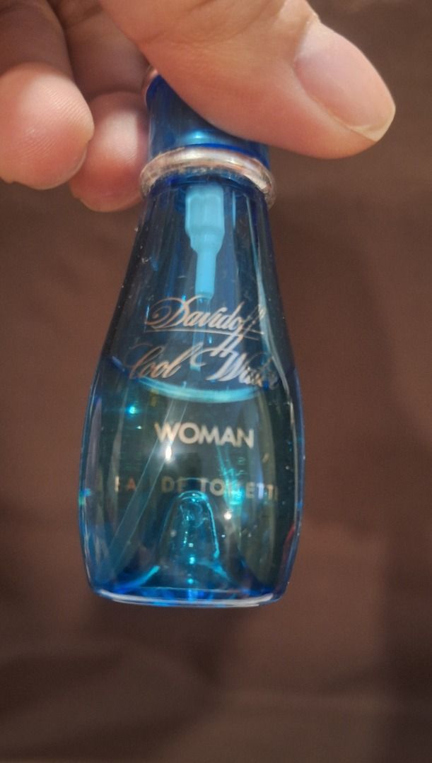 DAVIDOFF Cool Water Perfume (Category: Fragrance & Deodorants) located in General Trias. Submitted by aeunice (Listing ID 1407924368, Image 3). Description: 85% Full In Good Condition. Woman Eau de Toilette. It is a blue bottle with a silver cap. The bottle contains 5 fl oz of perfume. The perfume is for women. Meet up / Shipping via Lalamove, JnT, Gogo Express & LBC..