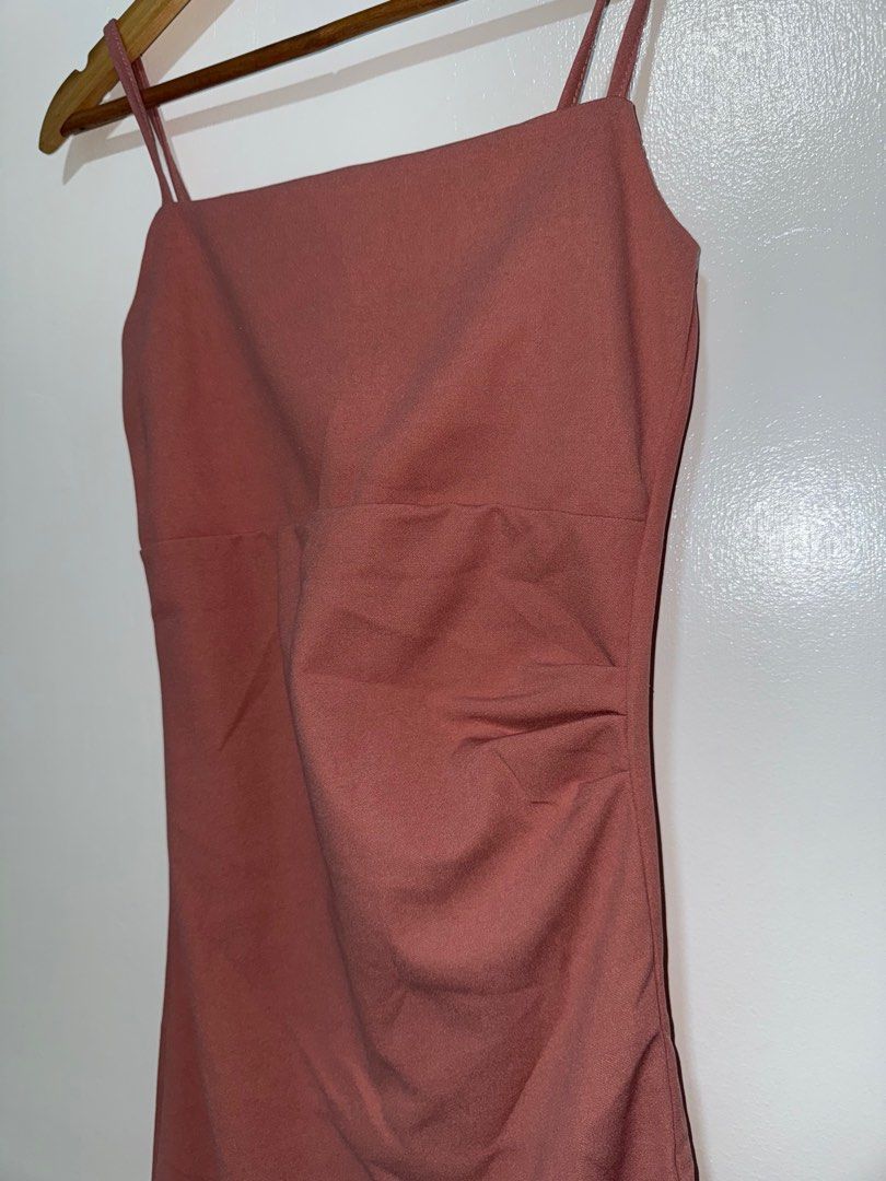 Dusty Rose Bodycon Dress (Category: Dresses) located in Manila. Submitted by angz12 (Listing ID 1407791417, Image 3). Description: - Dusty rose midi bodycon dress - Square neckline - Spaghetti straps - Ruched detail on one side - Slit at hem.