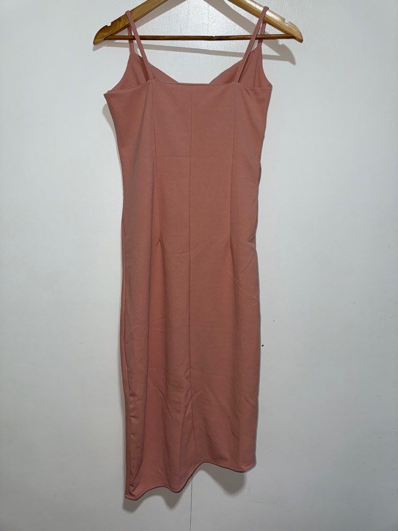 Dusty Rose Midi Dress (Category: Dresses) located in Manila. Submitted by angz12 (Listing ID 1407791562, Image 2). Description: - Dusty rose midi dress - Wrap-style bodice - Spaghetti straps - Fitted silhouette - Asymmetrical hemline - Perfect for special occasions - Subtle ruched side detail.