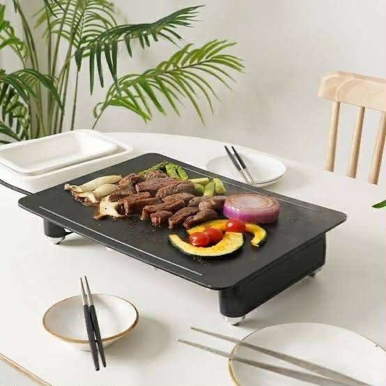 Everhome MilliGrill JF-G201 from Korea (Category: BBQ, Grills & Hotpots) located in Caloocan City. Submitted by dang_26 (Listing ID 1407758487, Image 2). Description: - Brand new Everhome MilliGrill JF-G201 - Still in original packaging - Stylish black design - Compact size, ideal for small spaces - Features 5mm thickness - Easy to clean.