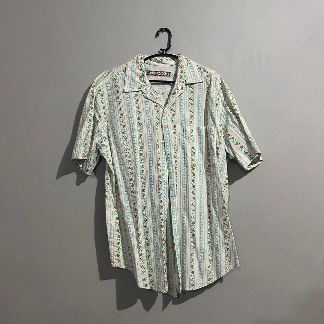 Floral Polo (Category: Tshirts & Polo Shirts ) located in Cavite. Submitted by isi____ (Listing ID 1407877040, Image 1). Description: Floral polo Lightly used Best fits Medium.