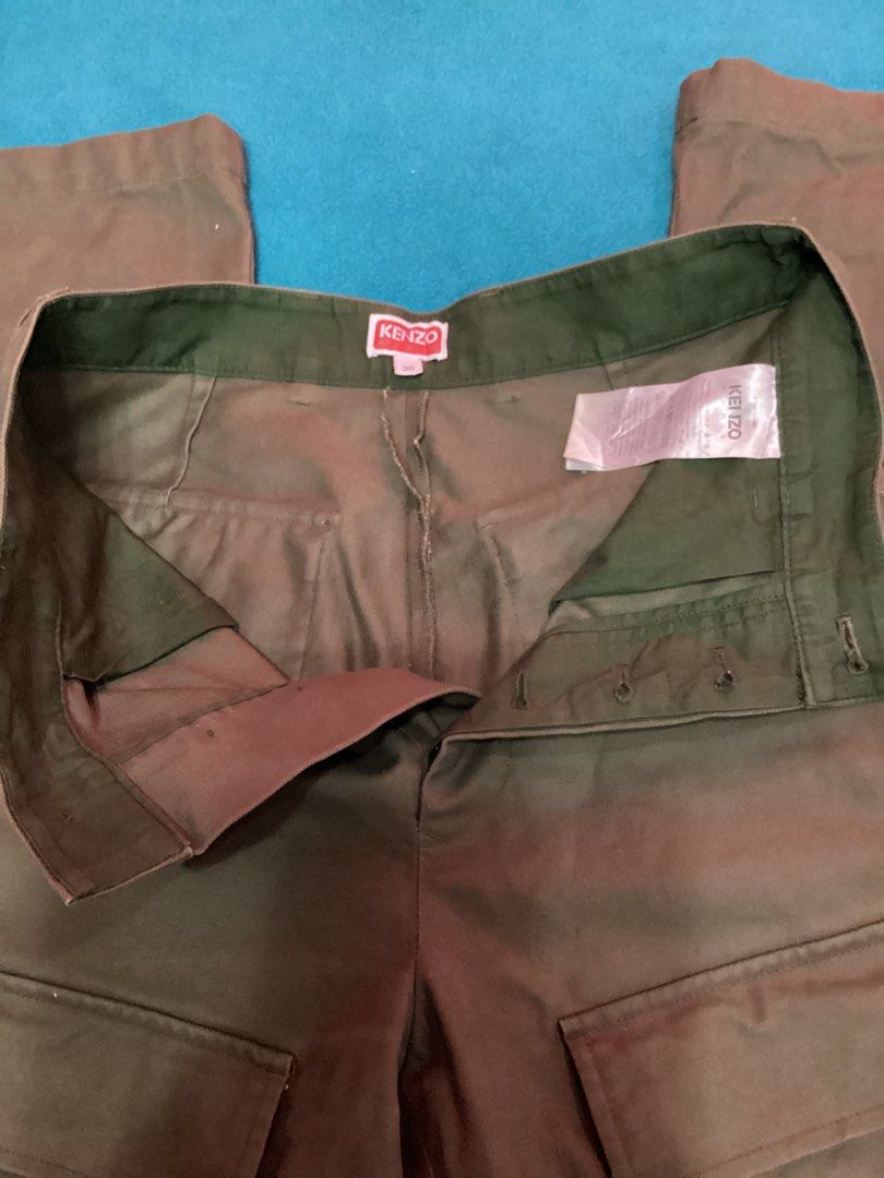 Kenzo Utility Pants, Khaki (Category: Coats, Jackets and Outerwear) located in Davao. Submitted by ferdipt (Listing ID 1407783209, Image 3). Description: Kenzo Paris, 36 Made in Romania Excellent Condition with noticeable usage. Check Stains on pics. Waist: 28-29 inches Length: 44 Inches.