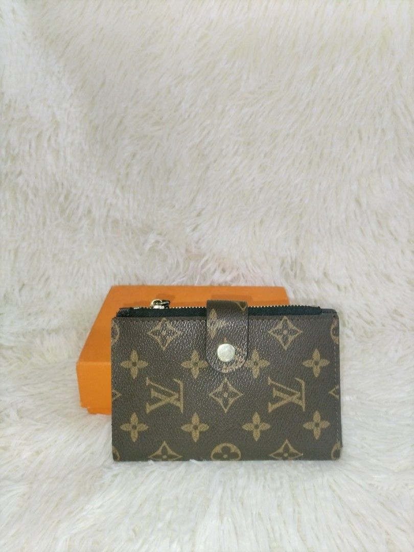 Louis vuitton bifold wallet (Category: Luxury Bags & Wallets) located in Davao. Submitted by cosmicforest_950ad8 (Listing ID 1407895343, Image 1). Description: -No box included -With code -medium size.