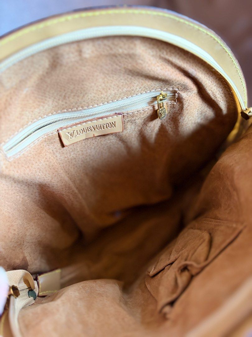 Louis Vuitton Ellipse Handbag Inspired (Category: Luxury Bags & Wallets) located in Pili. Submitted by readysetthrift (Listing ID 1407914059, Image 2). Description: - Authentic Louis Vuitton Ellipse handbag - Iconic monogram canvas - Rounded shape - Top handle - Spacious interior with zipper pocket - Light brown interior lining - Gold-tone zipper and hardware.